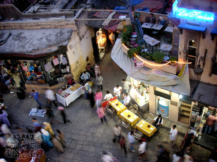 Fes, Morocco - Looking Down on the Medina - The Lotus and the Artichoke - World Travels Fes, Morocco - Medina and Gate - The Lotus and the Artichoke - electric blue neon