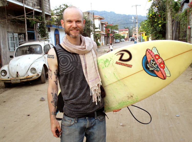 JPM with Surfboard in Lo de Marcos, Mexico - Vegan Cooking Adventures